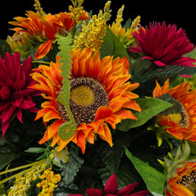 Load image into Gallery viewer, This Headstone Saddle is made with grave flowers including Orange Sunflowers and Burgandy Mums. It's a summer or fall memorial decoration.

