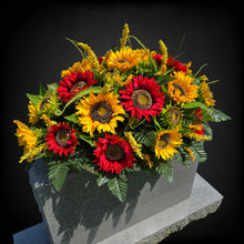 Load image into Gallery viewer, This Headstone Saddle is made with grave flowers including Yellow and Red Sunflowers. It's a summer or fall memorial decoration.
