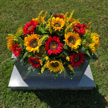 Load image into Gallery viewer, This Headstone Saddle is made with grave flowers including Yellow and Red Sunflowers. It's a summer or fall memorial decoration.
